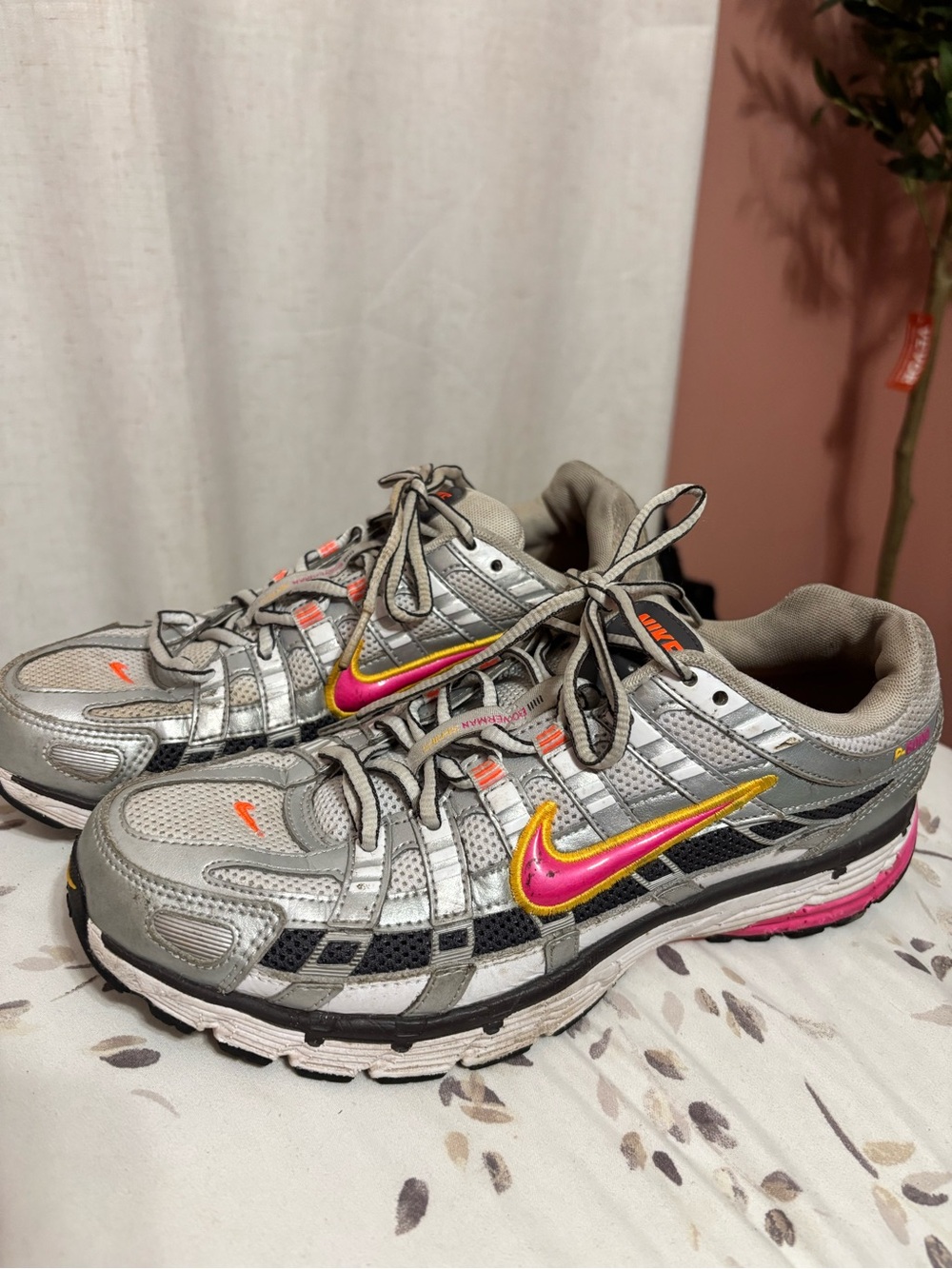 Nike Women's Silver Running Sneakers with Pink & Gold Swoosh Accent